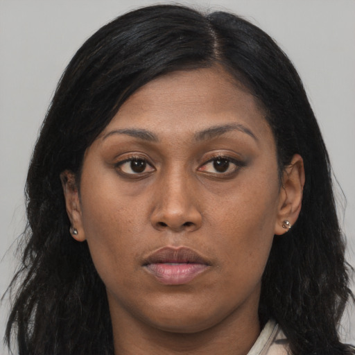 Neutral black young-adult female with long  black hair and brown eyes