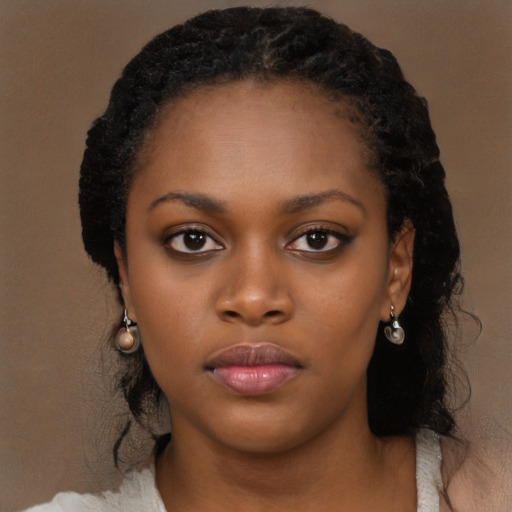 Neutral black young-adult female with long  black hair and brown eyes