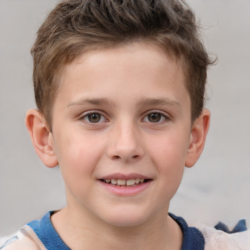 Joyful white child male with short  brown hair and grey eyes