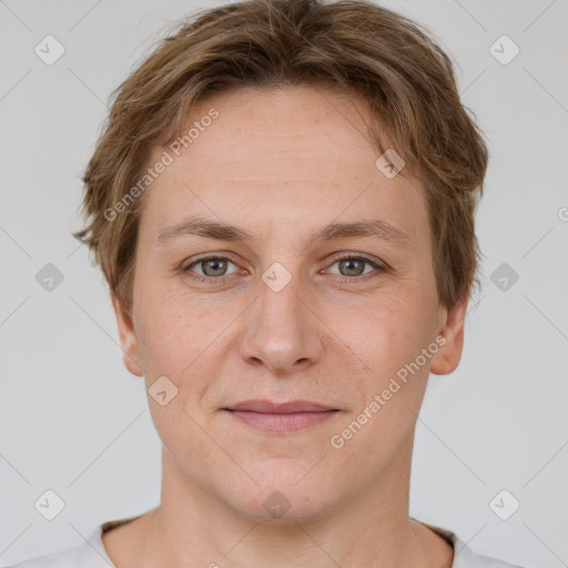 Joyful white young-adult female with short  brown hair and grey eyes