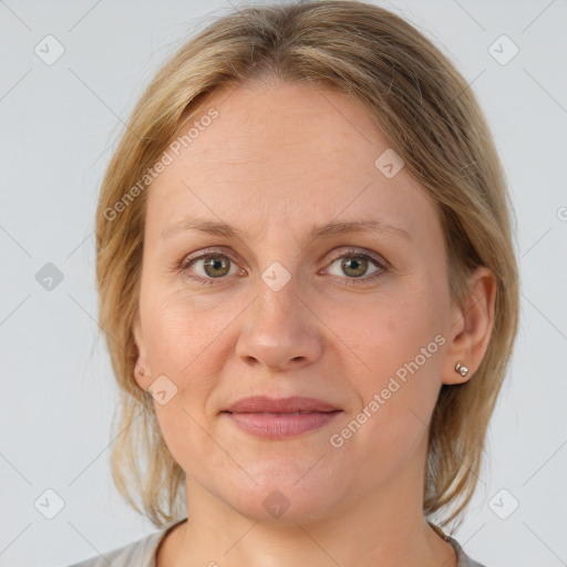 Joyful white adult female with medium  brown hair and grey eyes