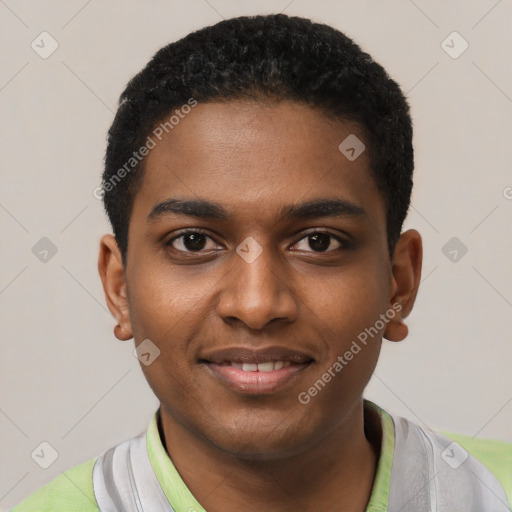 Joyful black young-adult male with short  black hair and brown eyes