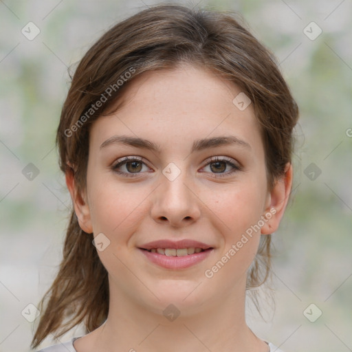 Joyful white young-adult female with medium  brown hair and green eyes