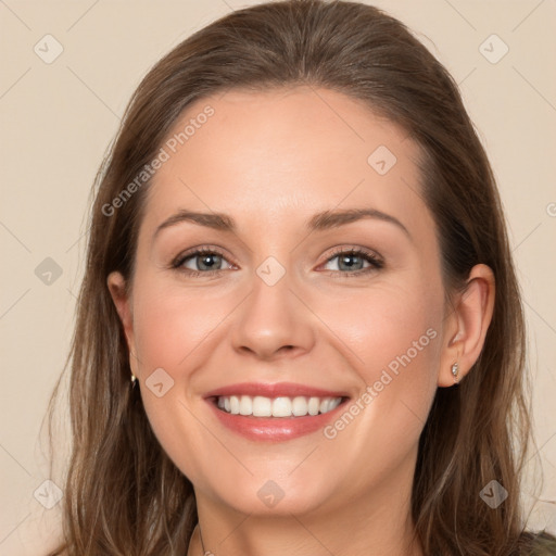 Joyful white young-adult female with long  brown hair and grey eyes