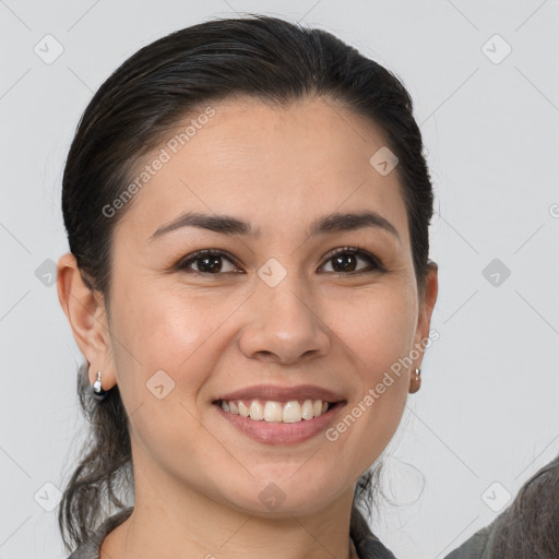 Joyful white young-adult female with medium  brown hair and brown eyes