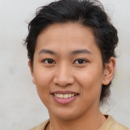 Joyful asian young-adult female with short  brown hair and brown eyes