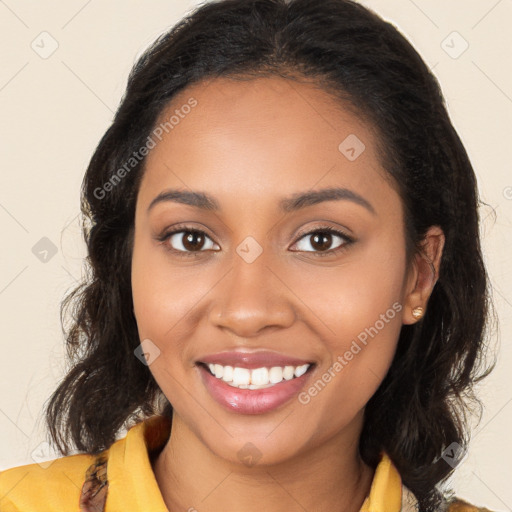 Joyful black young-adult female with medium  brown hair and brown eyes