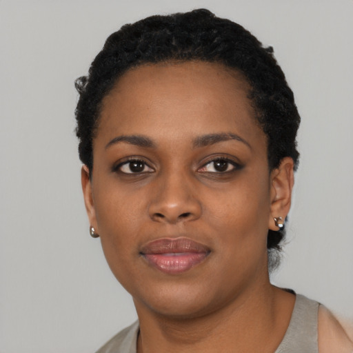 Neutral black young-adult female with short  black hair and brown eyes