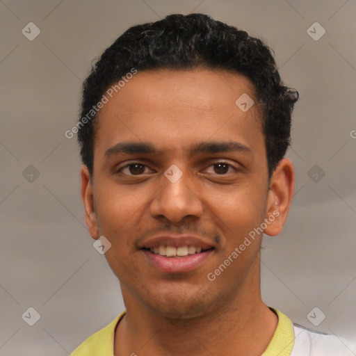 Joyful latino young-adult male with short  black hair and brown eyes