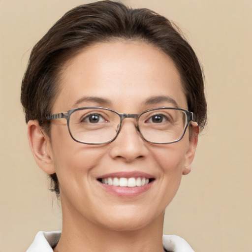 Joyful white adult female with short  brown hair and brown eyes