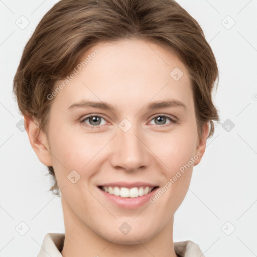 Joyful white young-adult female with short  brown hair and grey eyes