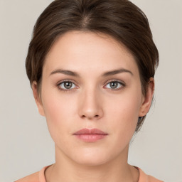 Neutral white young-adult female with short  brown hair and grey eyes