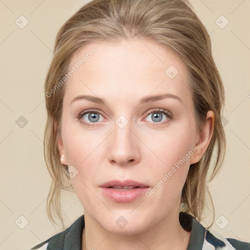 Neutral white young-adult female with medium  brown hair and blue eyes