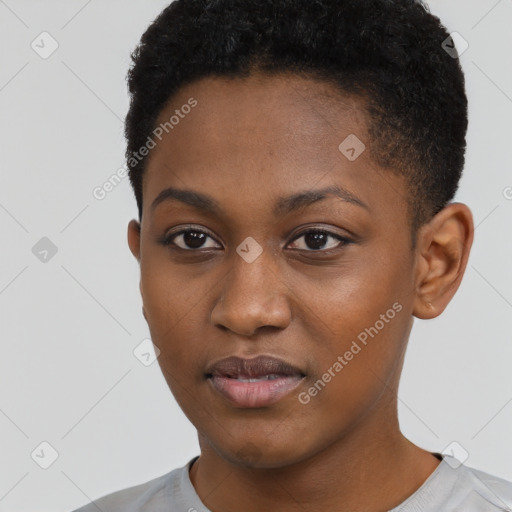 Joyful black young-adult female with short  black hair and brown eyes