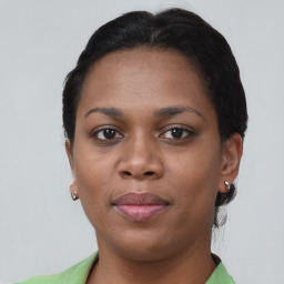 Neutral black young-adult female with short  brown hair and brown eyes