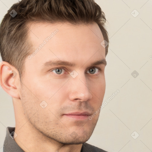 Neutral white young-adult male with short  brown hair and grey eyes