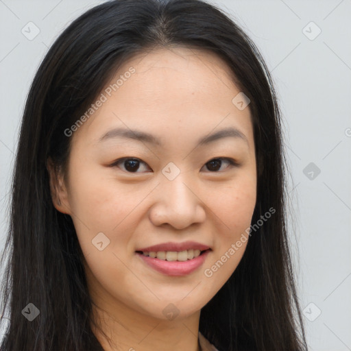 Joyful asian young-adult female with long  brown hair and brown eyes