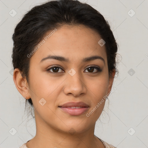 Joyful latino young-adult female with short  brown hair and brown eyes