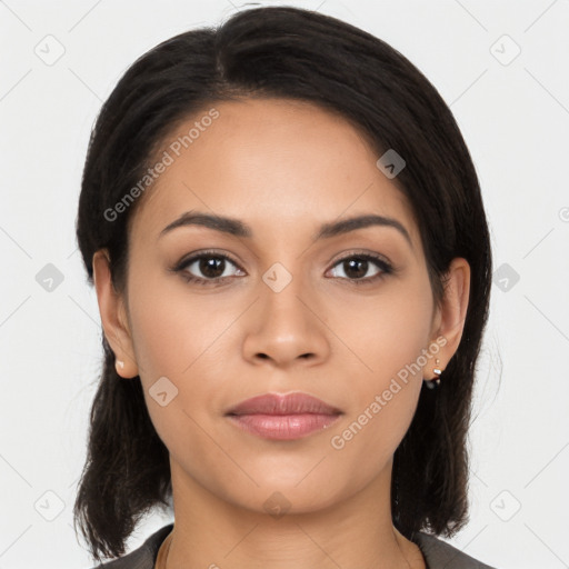 Joyful latino young-adult female with long  black hair and brown eyes