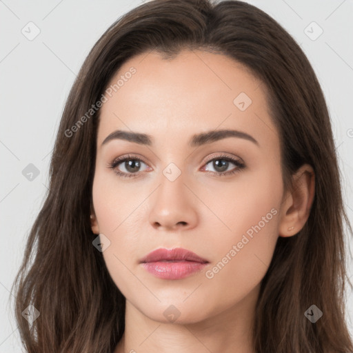 Neutral white young-adult female with long  brown hair and brown eyes