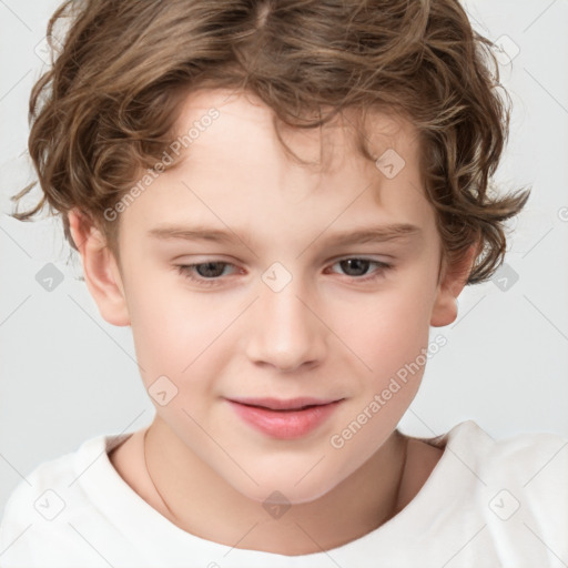 Joyful white child male with short  brown hair and brown eyes