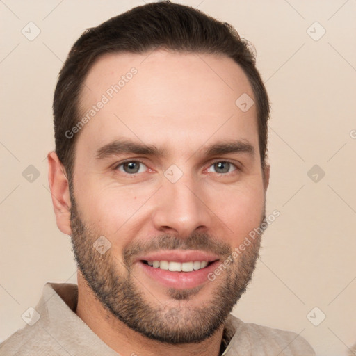 Joyful white young-adult male with short  brown hair and brown eyes