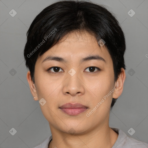 Joyful asian young-adult female with short  black hair and brown eyes