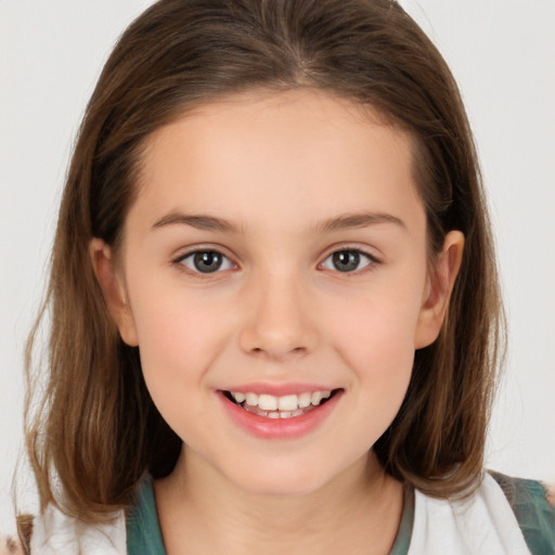 Joyful white child female with medium  brown hair and brown eyes