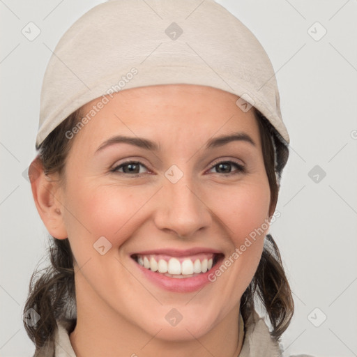 Joyful white young-adult female with medium  brown hair and grey eyes