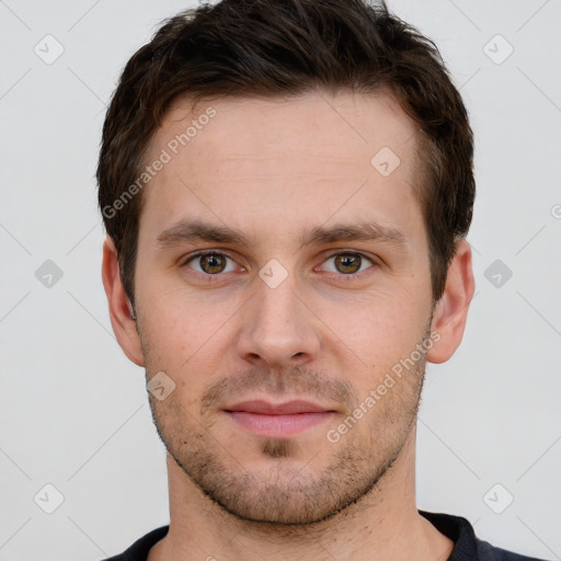 Joyful white young-adult male with short  brown hair and brown eyes