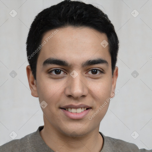 Joyful latino young-adult male with short  black hair and brown eyes