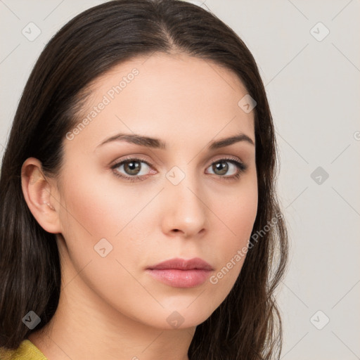 Neutral white young-adult female with long  brown hair and brown eyes