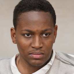 Neutral black young-adult male with short  brown hair and brown eyes