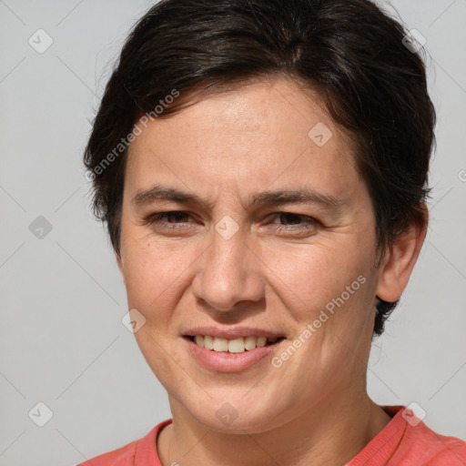 Joyful white adult female with medium  brown hair and brown eyes