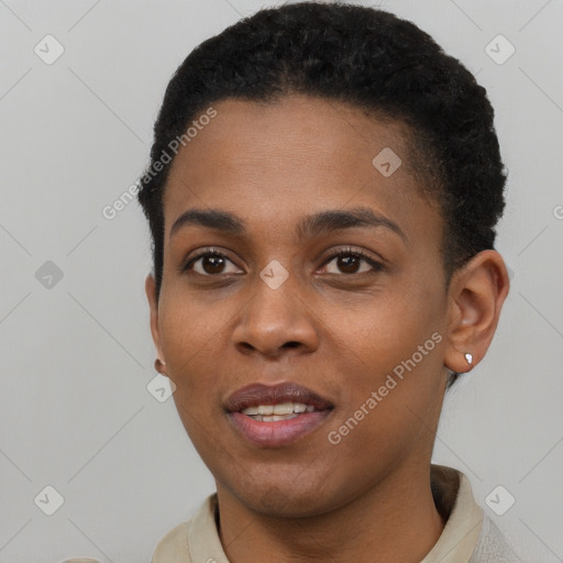 Joyful black young-adult female with short  black hair and brown eyes