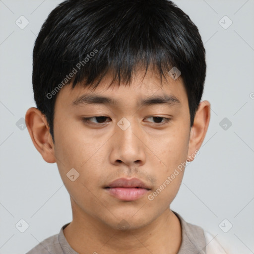 Neutral asian young-adult male with short  brown hair and brown eyes
