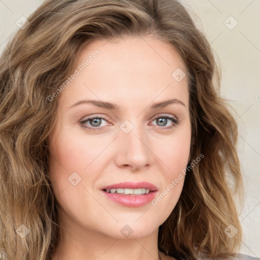 Joyful white young-adult female with long  brown hair and green eyes