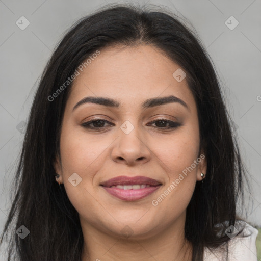 Joyful latino young-adult female with long  brown hair and brown eyes