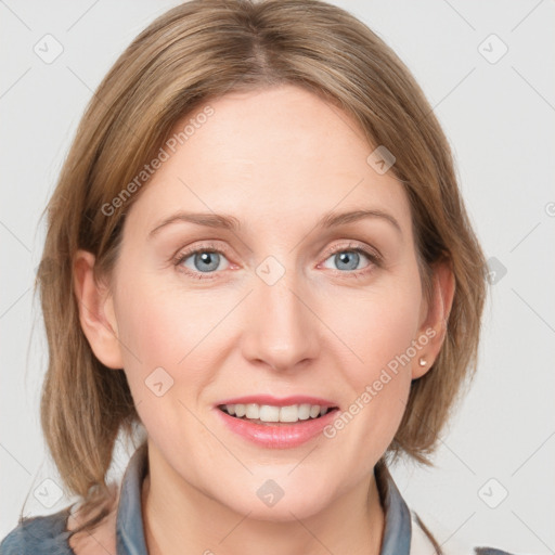 Joyful white young-adult female with medium  brown hair and blue eyes