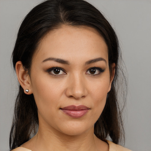 Joyful white young-adult female with medium  brown hair and brown eyes