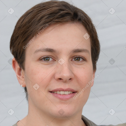 Joyful white young-adult female with short  brown hair and grey eyes