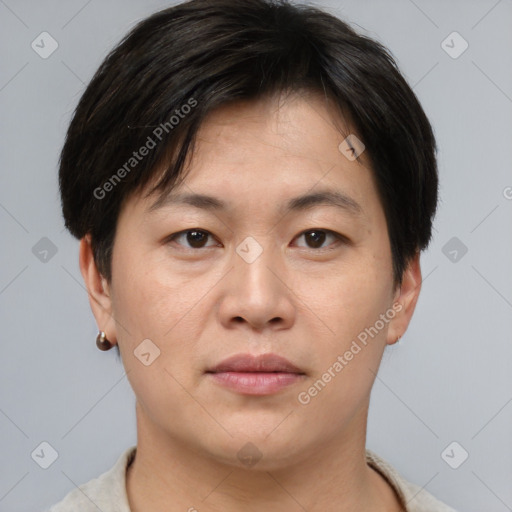 Neutral asian young-adult male with short  brown hair and brown eyes