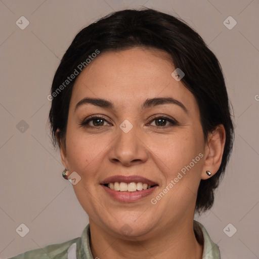 Joyful white adult female with medium  brown hair and brown eyes