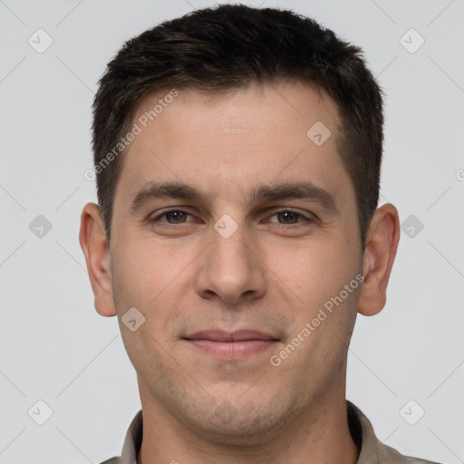 Joyful white young-adult male with short  brown hair and brown eyes