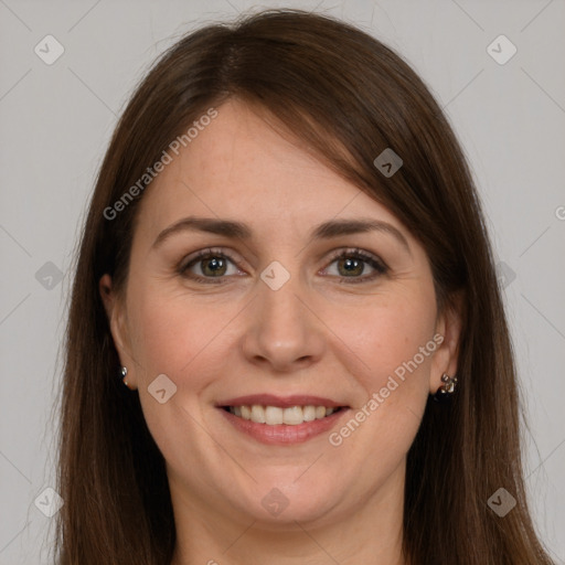 Joyful white young-adult female with long  brown hair and grey eyes