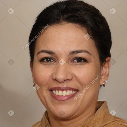 Joyful white adult female with short  brown hair and brown eyes