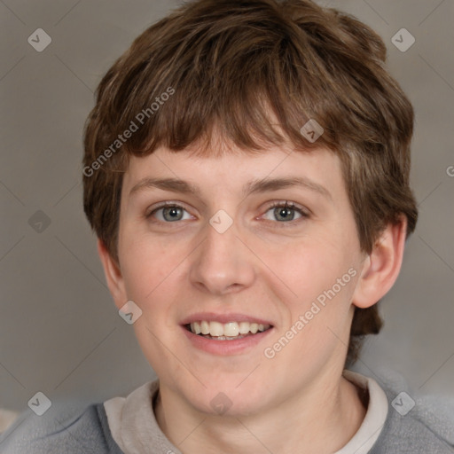 Joyful white young-adult female with short  brown hair and grey eyes