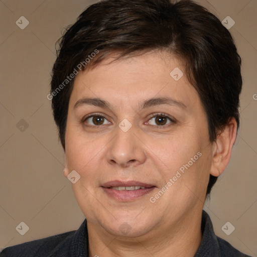 Joyful white adult female with short  brown hair and brown eyes