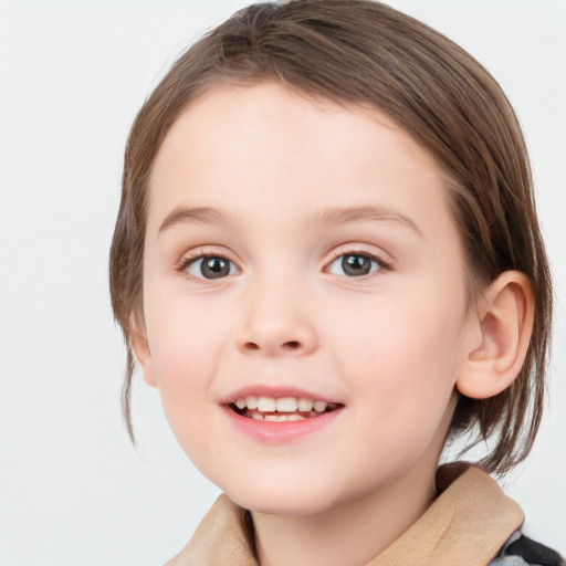 Joyful white child female with medium  brown hair and brown eyes