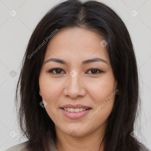 Joyful asian young-adult female with long  brown hair and brown eyes